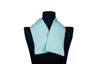 Blue handmade organic microwavable heated neck wrap for natural neck pain relief on a mannequin