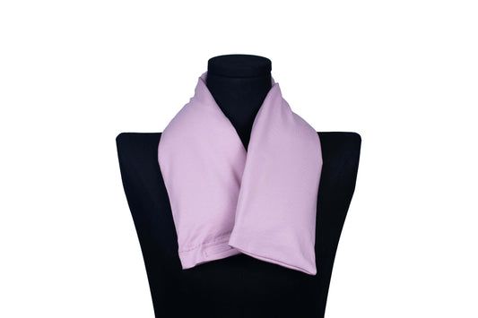 Pink handmade organic microwavable heated neck wrap for natural neck pain relief on a mannequin