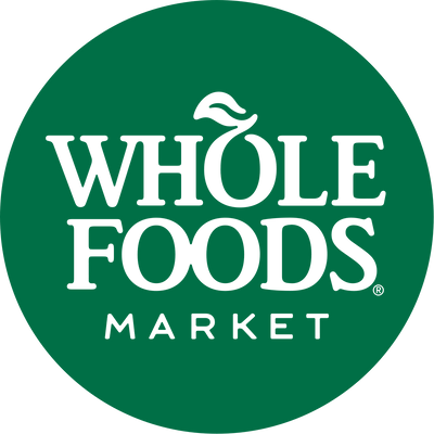 Whole Foods Market logo on a green circle